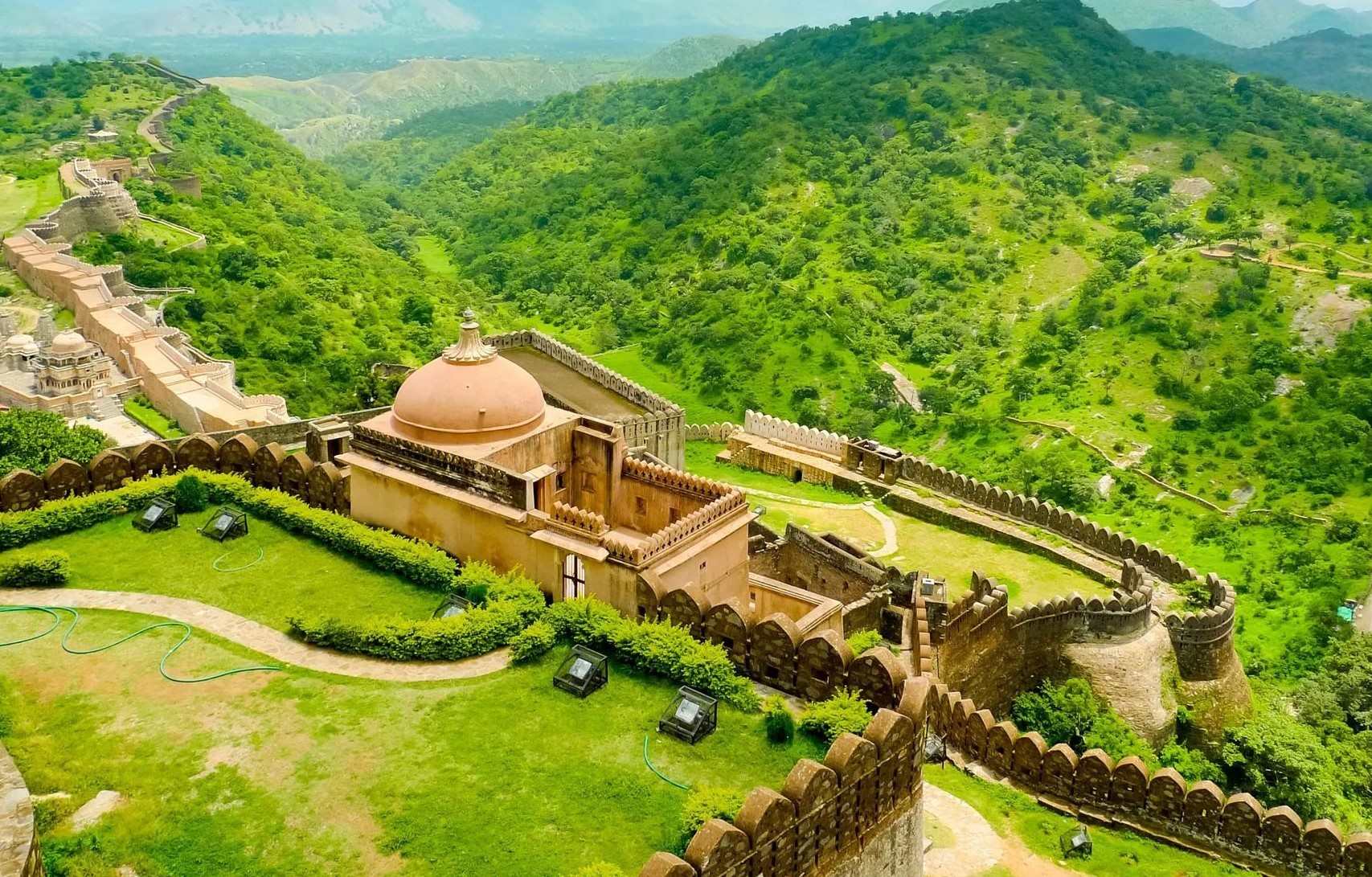 Kumbhalgarh Fort in Rajasthan, with massive walls, temples, and palaces, offering breathtaking views from the hilltop