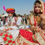 Jaisalmer Desert Festival in Rajasthan, featuring camel races, folk performances, and traditional dance amidst the desert landscape.
