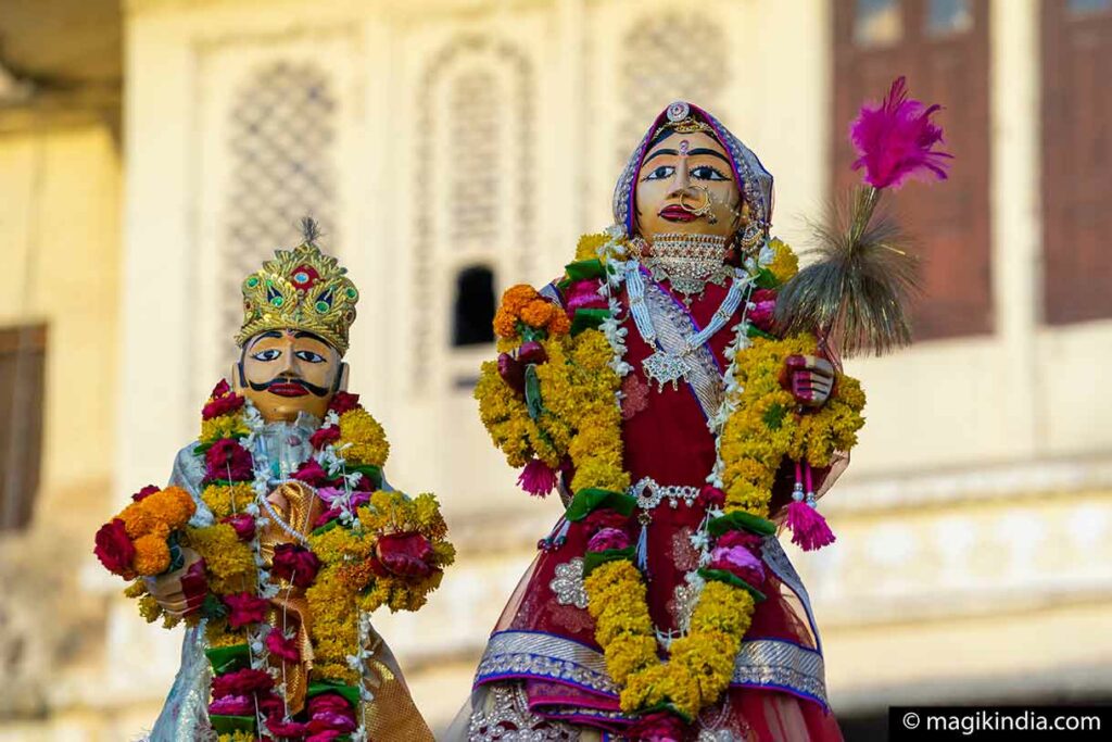 Gangaur Festival in Rajasthan, with women in colorful attire, participating in prayers, dances, and processions to honor Goddess Gauri