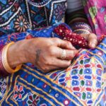 Rajasthan textiles, showcasing intricate weaving, embroidery, and vibrant colors, representing the region's rich cultural heritage